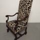 Pair of ceremonial armchairs in blackened oak, France late 18th century.