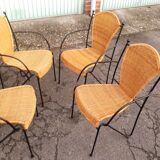 4 vintage wrought iron rattan chairs.