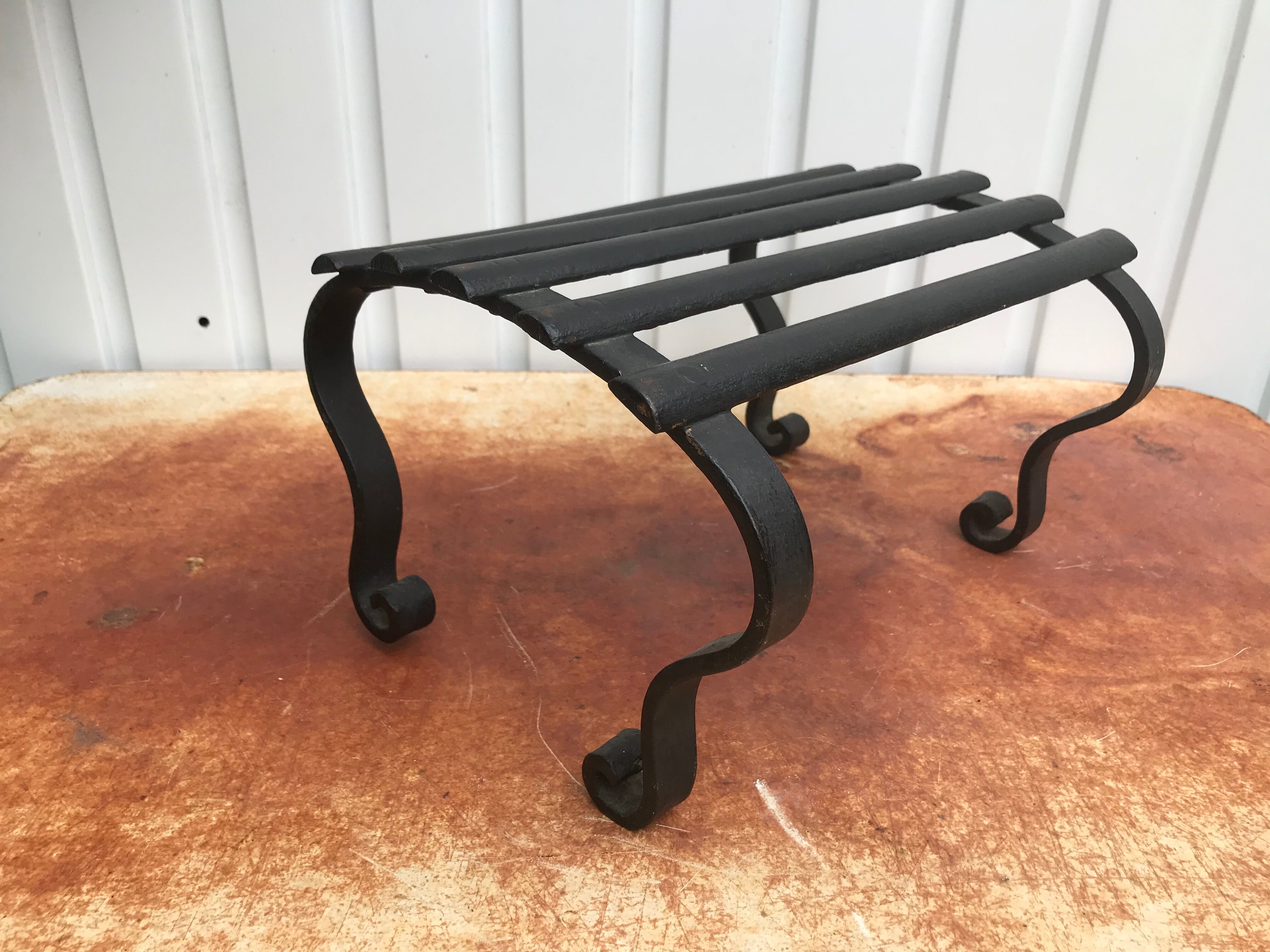 Wrought iron footrest