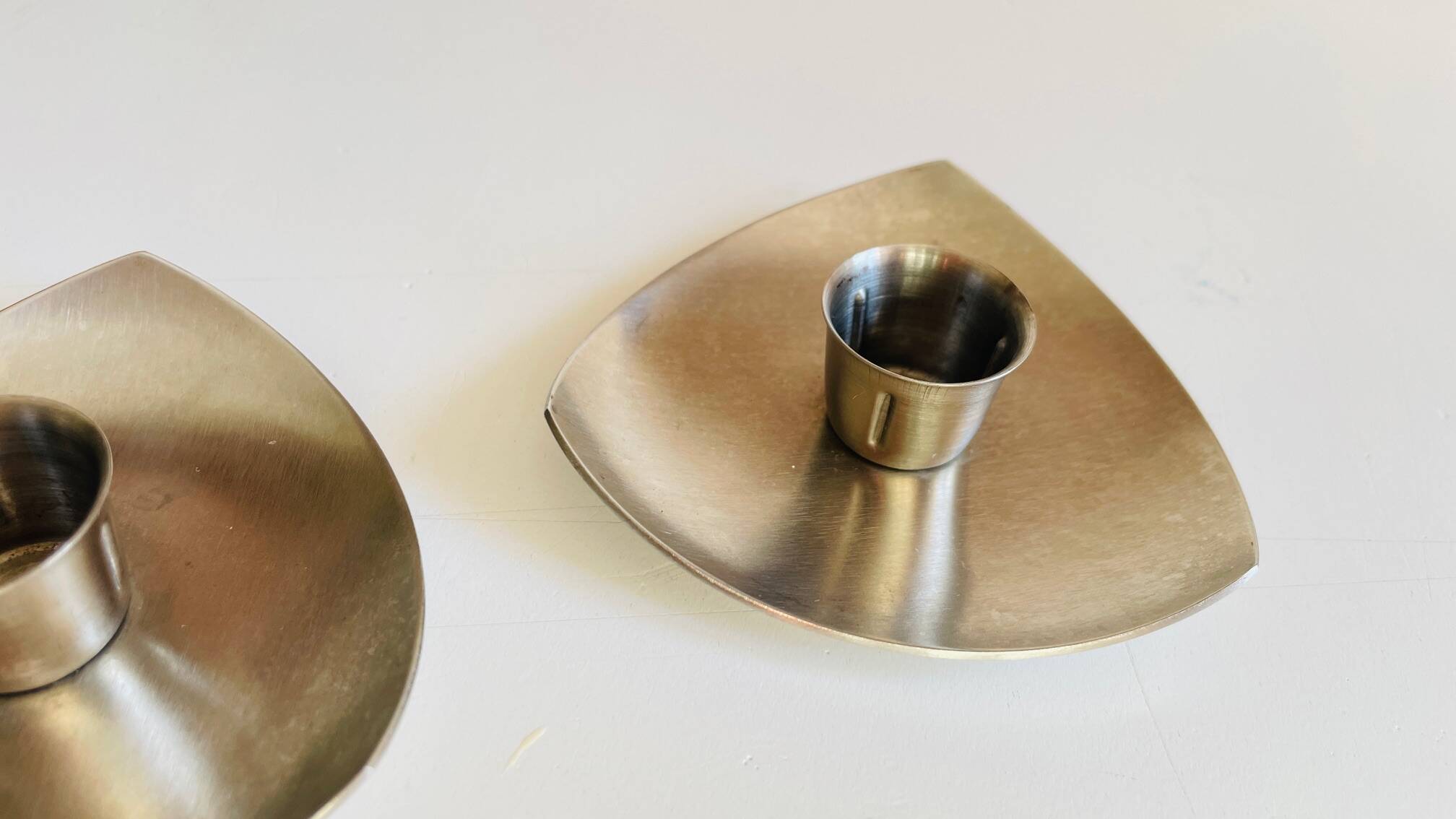 Vintage brushed metal geometric candle holders