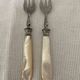 12 dessert forks in steel and mother-of-pearl
