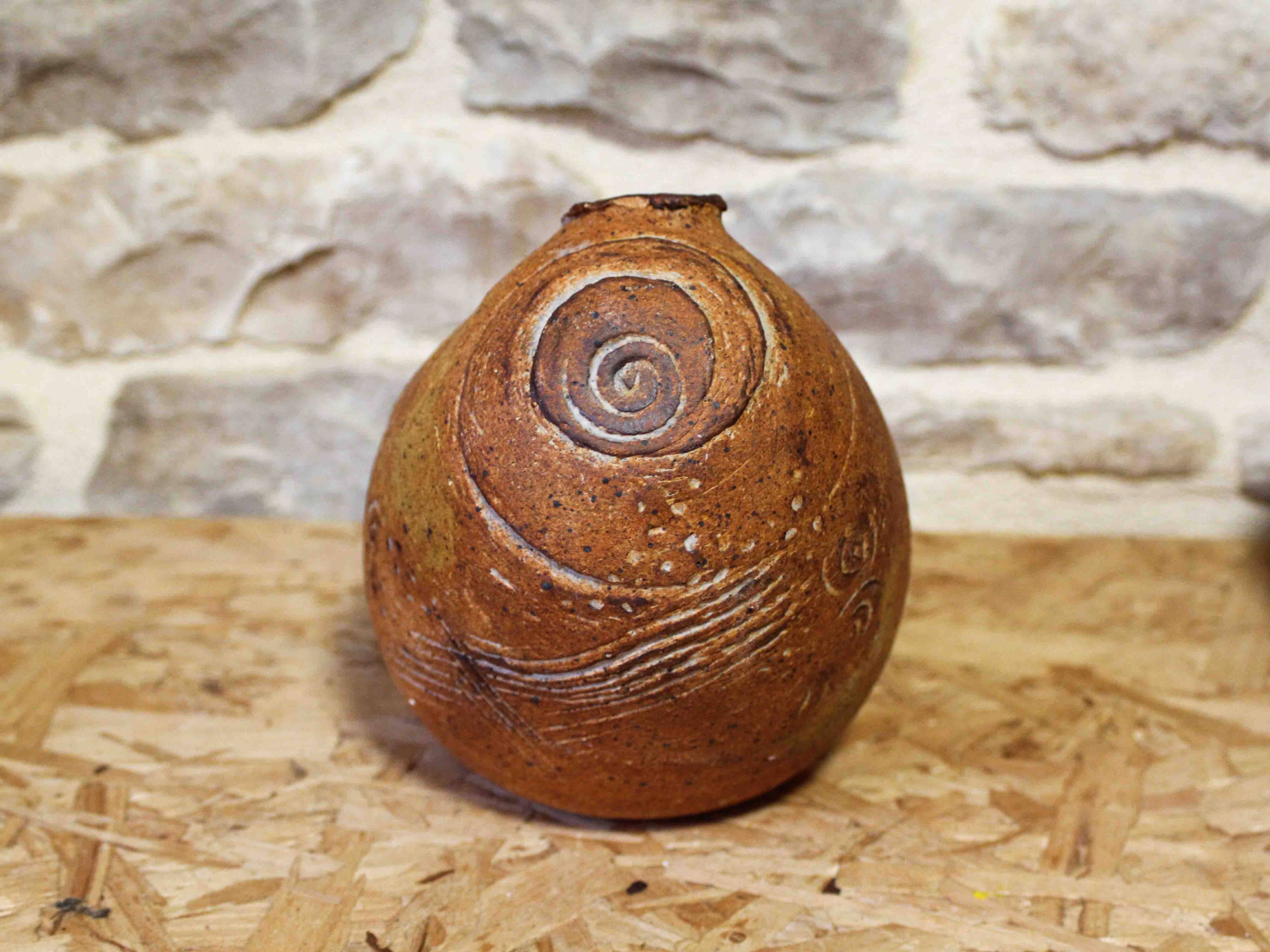 Stoneware vase with incised decoration