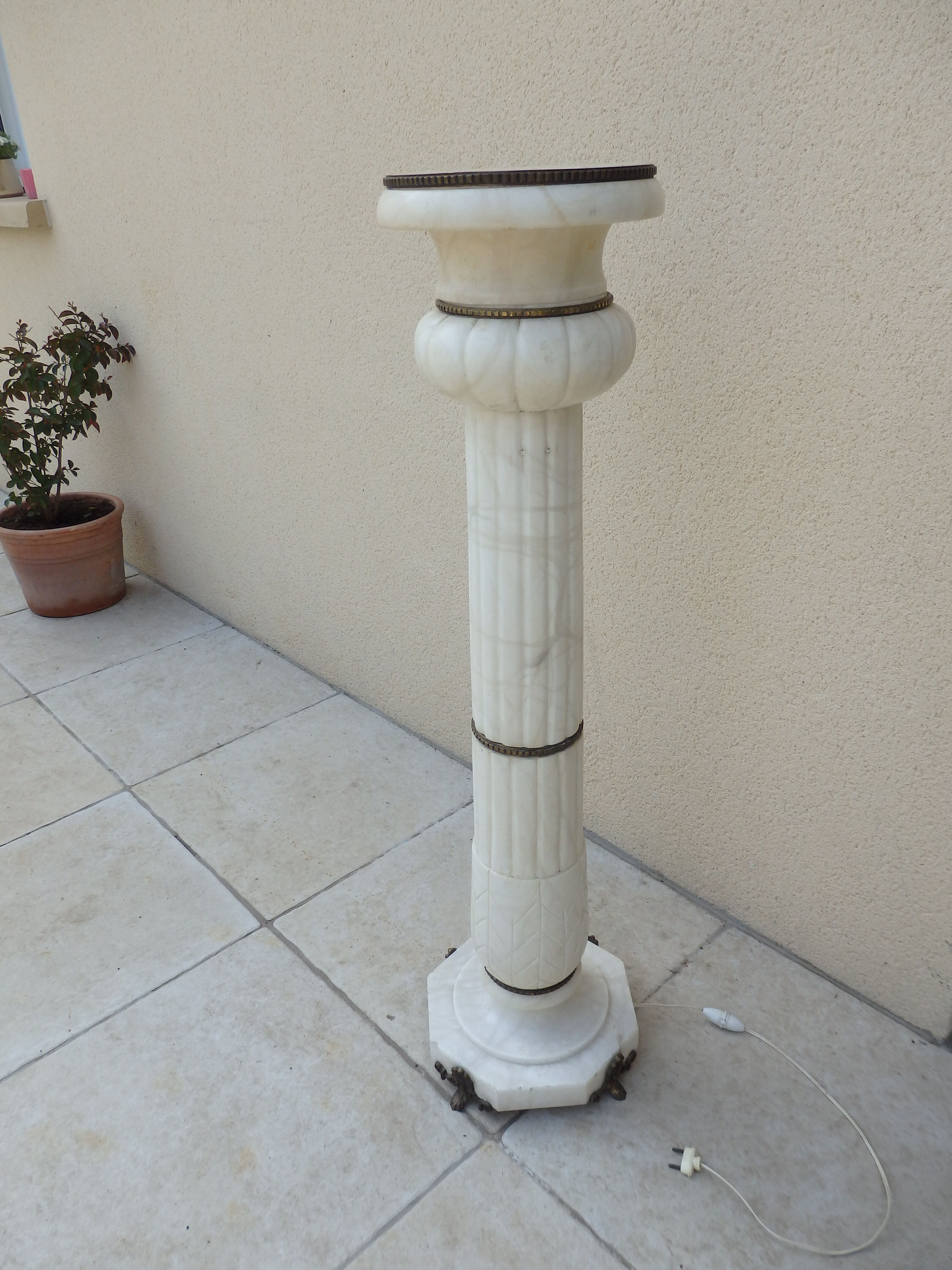 Antique luminous alabaster and bronze column