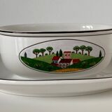 Naïve Design oval sauce boat on its Villeroy & Boch glass-porcelain display