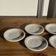Set of 9 small Italian dessert plates Primula with red and green trim.