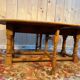 English gateleg coffee table in solid fir from the early 20th century.