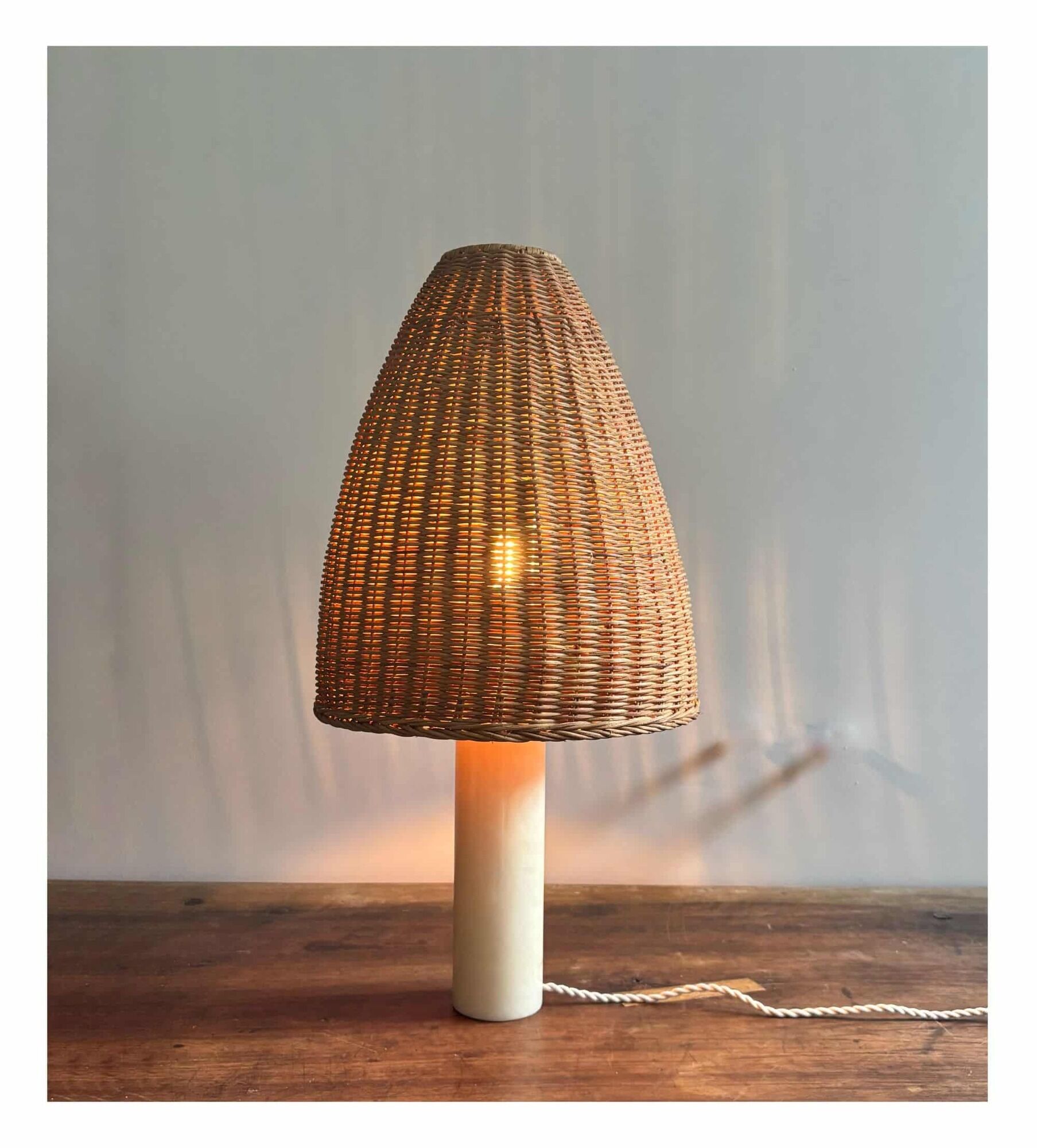 Vintage alabaster table lamp, soft yellow/cream, wicker shade