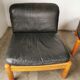 Pair of designer leather armchairs 80s