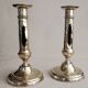 Pair of yellow copper candlesticks