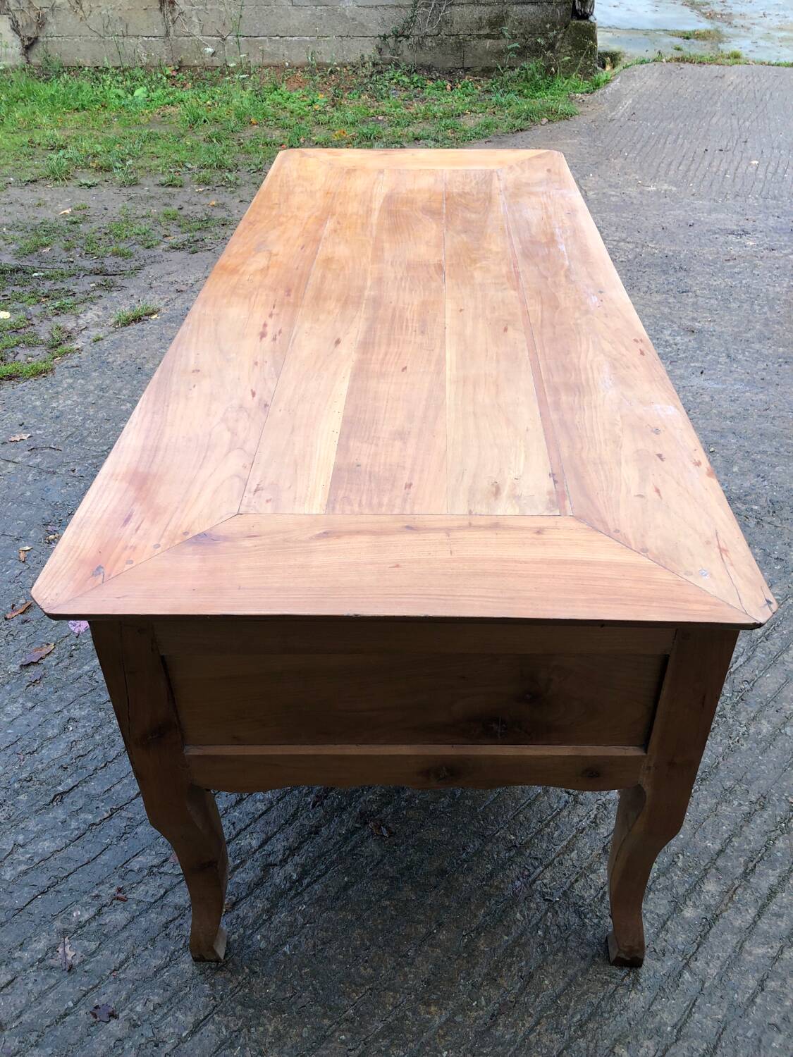 Antique Louis XV table with 3 drawers and 1 pull-out in solid cherry wood