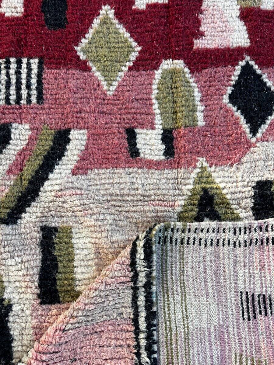 Pink and red Berber Boujad rug in wool, bohemian decor.