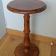 Round pedestal table in solid wood