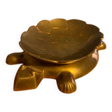 Empty brass turtle pocket