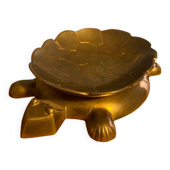 Empty brass turtle pocket
