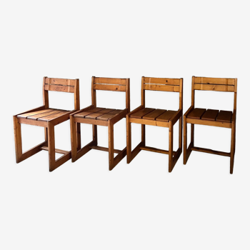 Suite de 4 chaises en pin par André Sornay