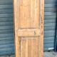 pair of old double-leaf doors with transom and carved frames