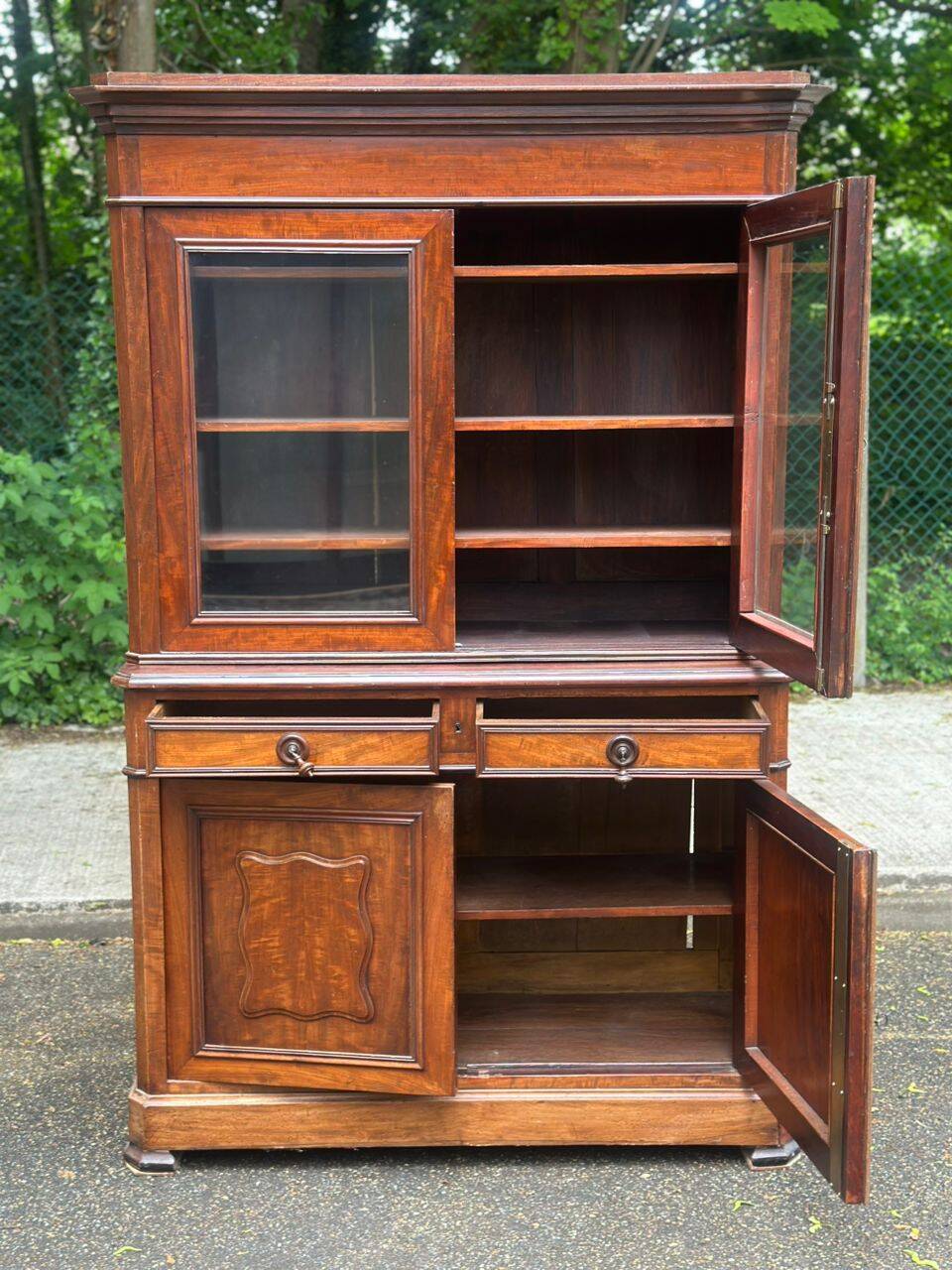 Glass library in Louis Philippe style from the 19th century made of solid wood.