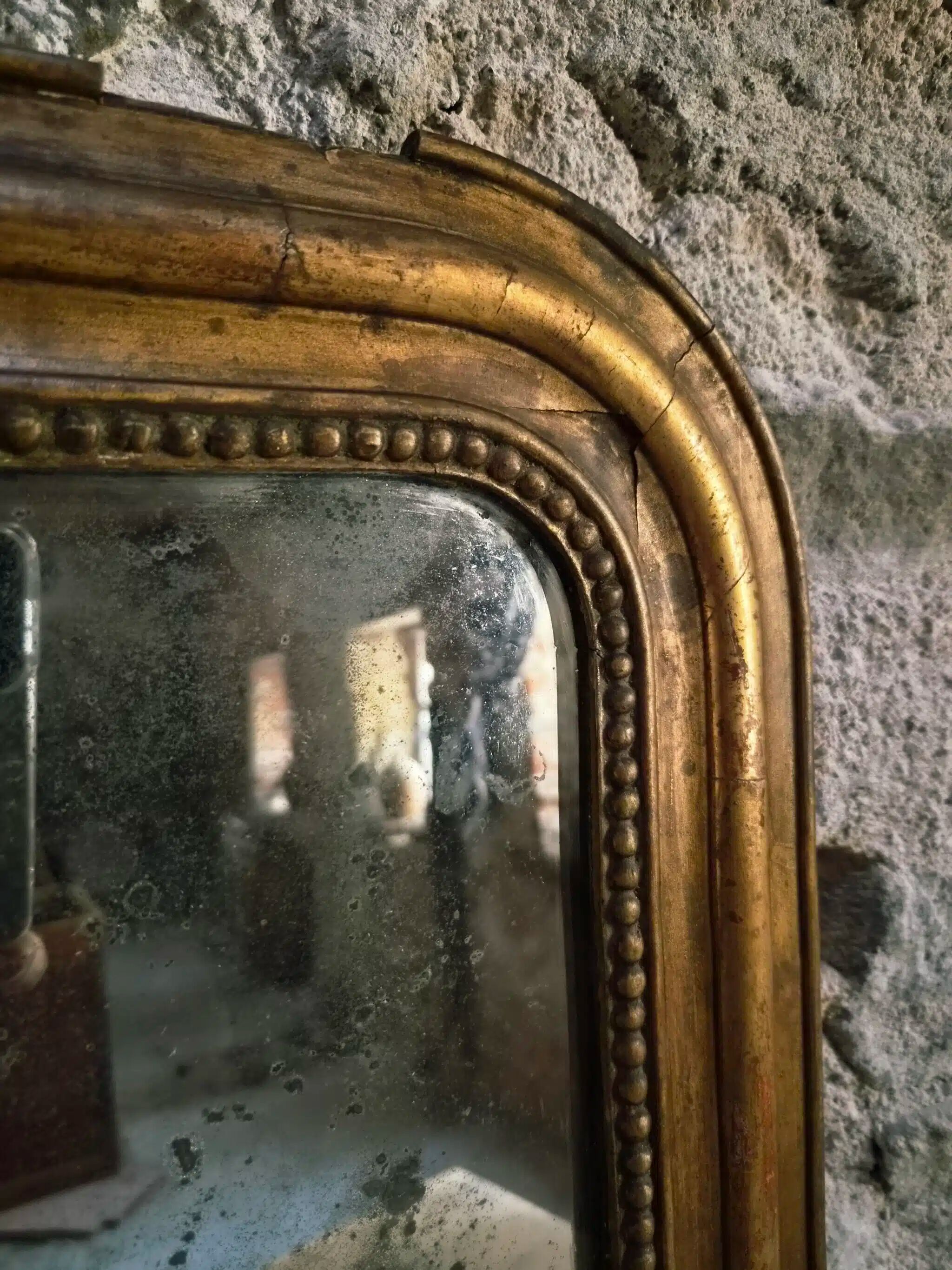 Antique French Louis Philippe mirror, gilded mercury mirror, 19th century.
