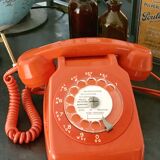 Old orange vintage dial phone