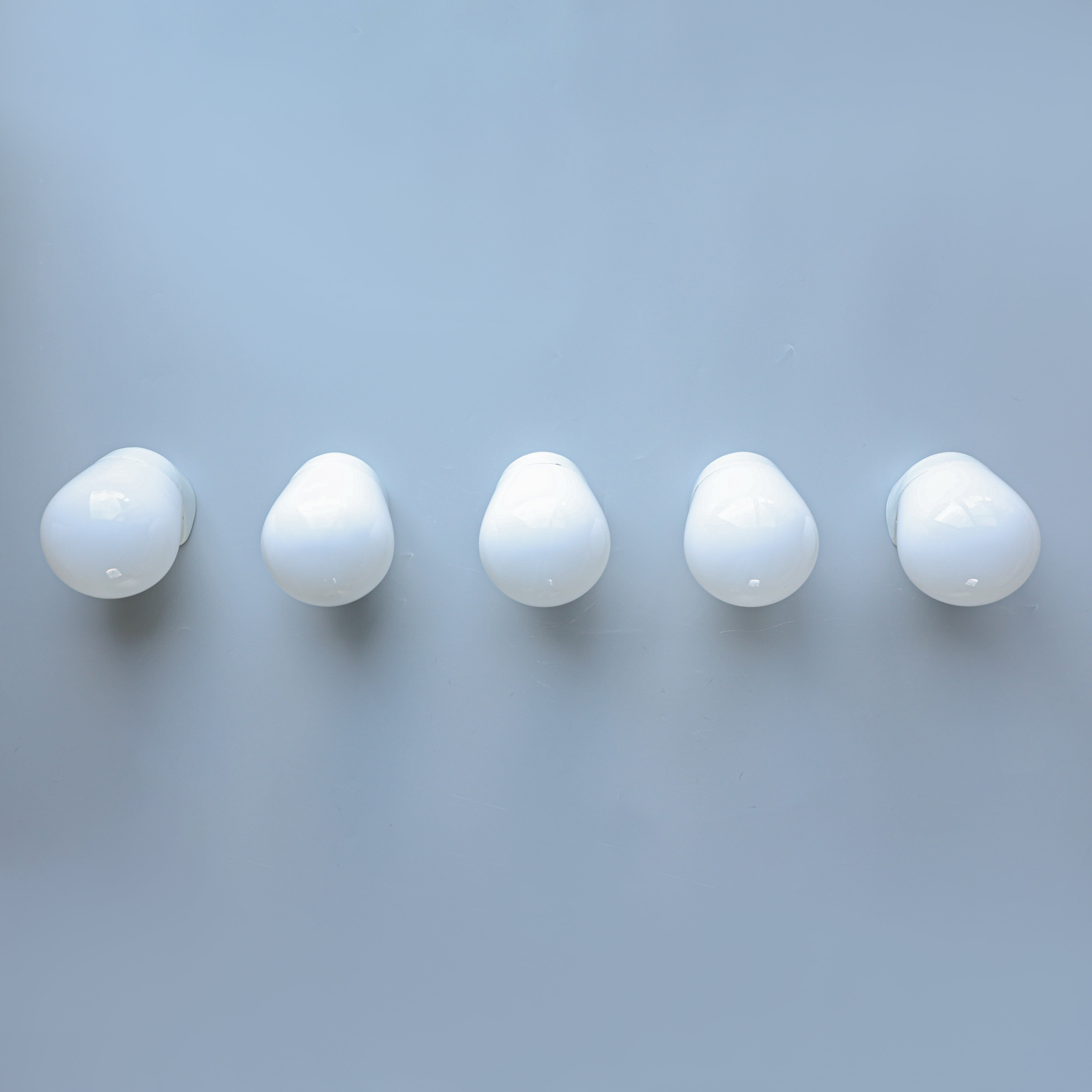 Wilhelm Wagenfeld, ceiling lights, porcelain, 1950s.