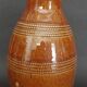 Mid-20th century brown glazed stoneware wine pitcher