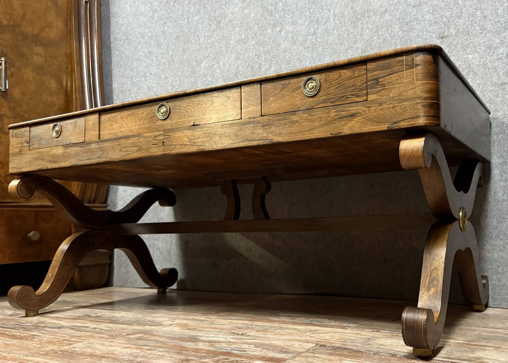 Very large Charles X period center desk in rosewood and lemonwood