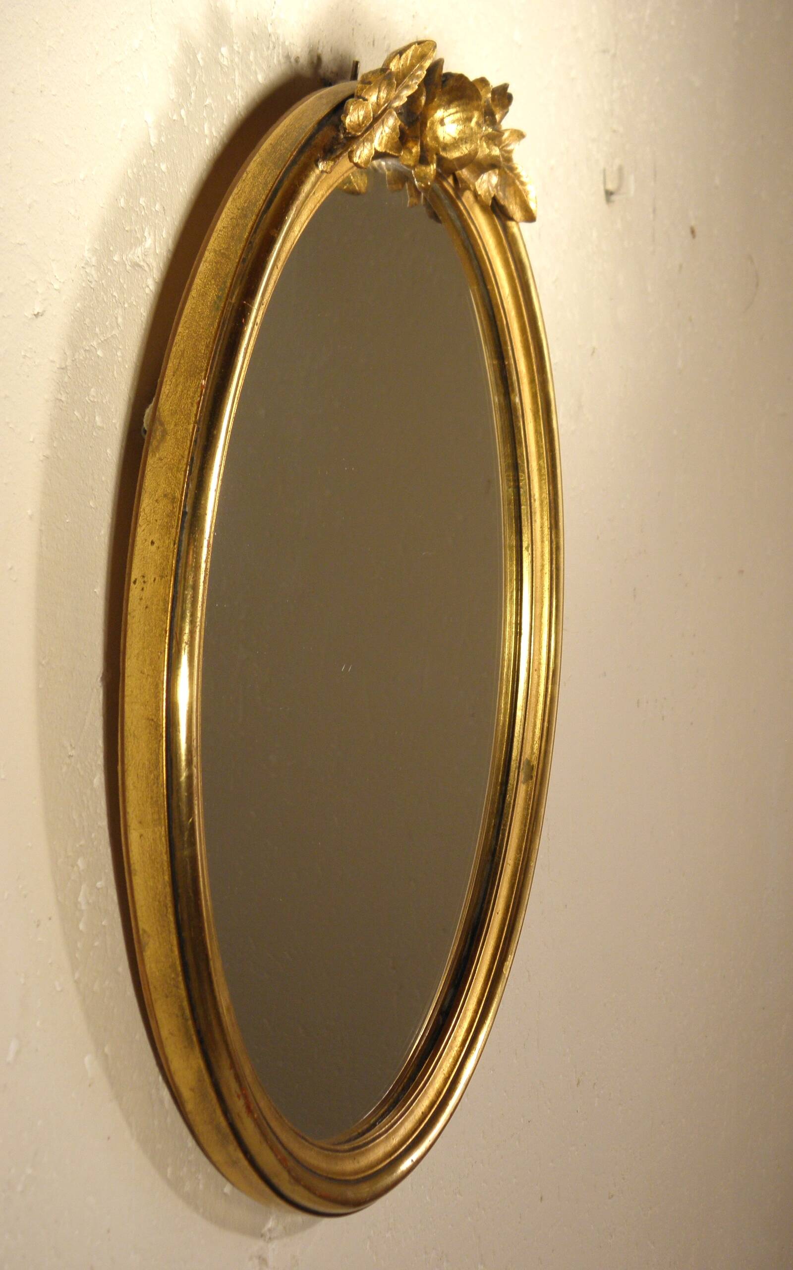 Oval gilded wood mirror 45 x 34