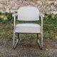 Set of 2 chairs and 1 armchair from the 70s in chrome metal and faux leather.