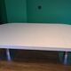 Ligne Roset table in glossy white lacquer, chrome legs, 2 extensions.