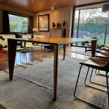Dining table ligne roset model trapèze in solid walnut with oil finish.