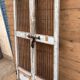 Art Deco patio door in Burmese teak with original patina.