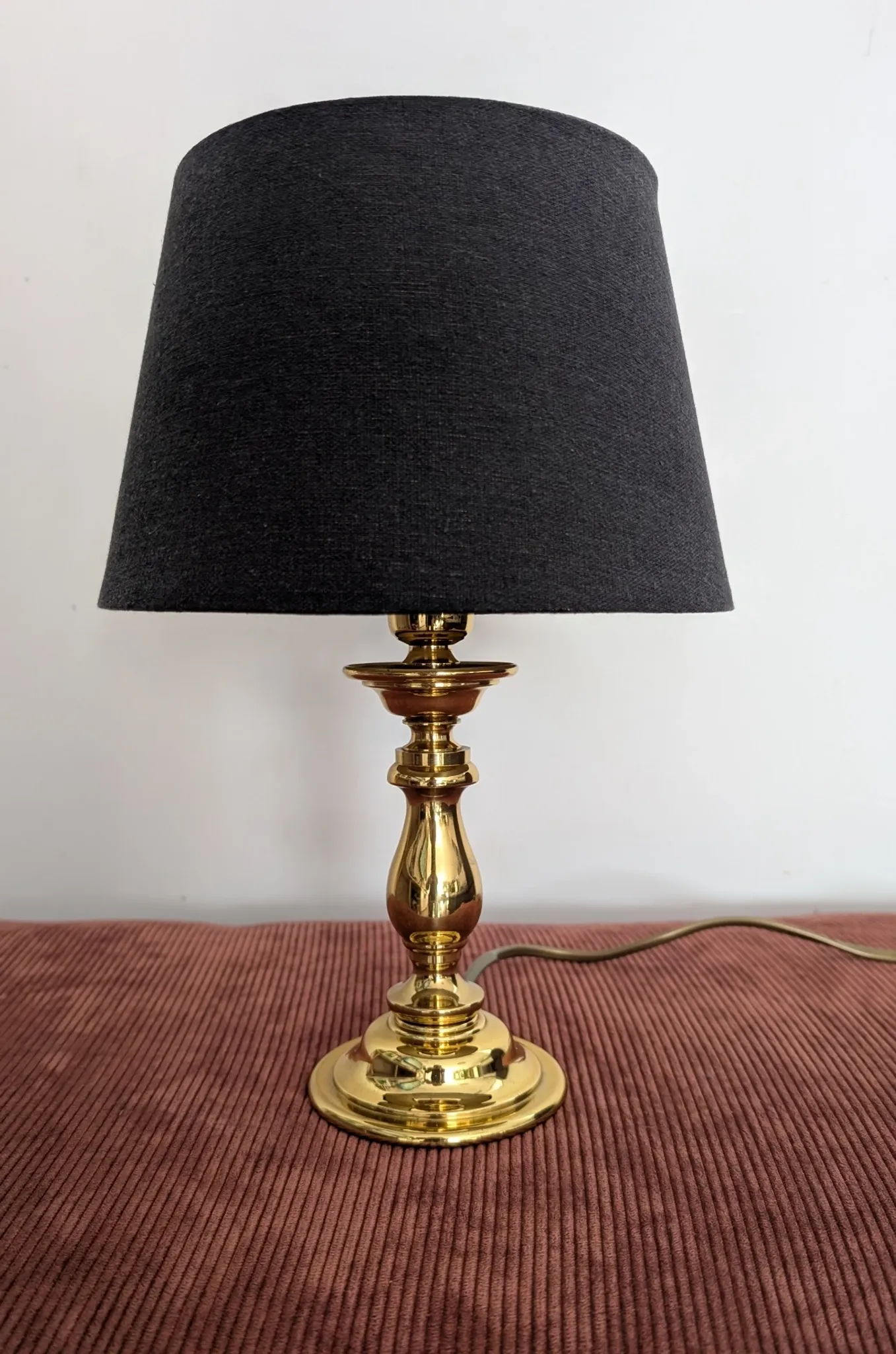 Brass lamp with black fabric shade