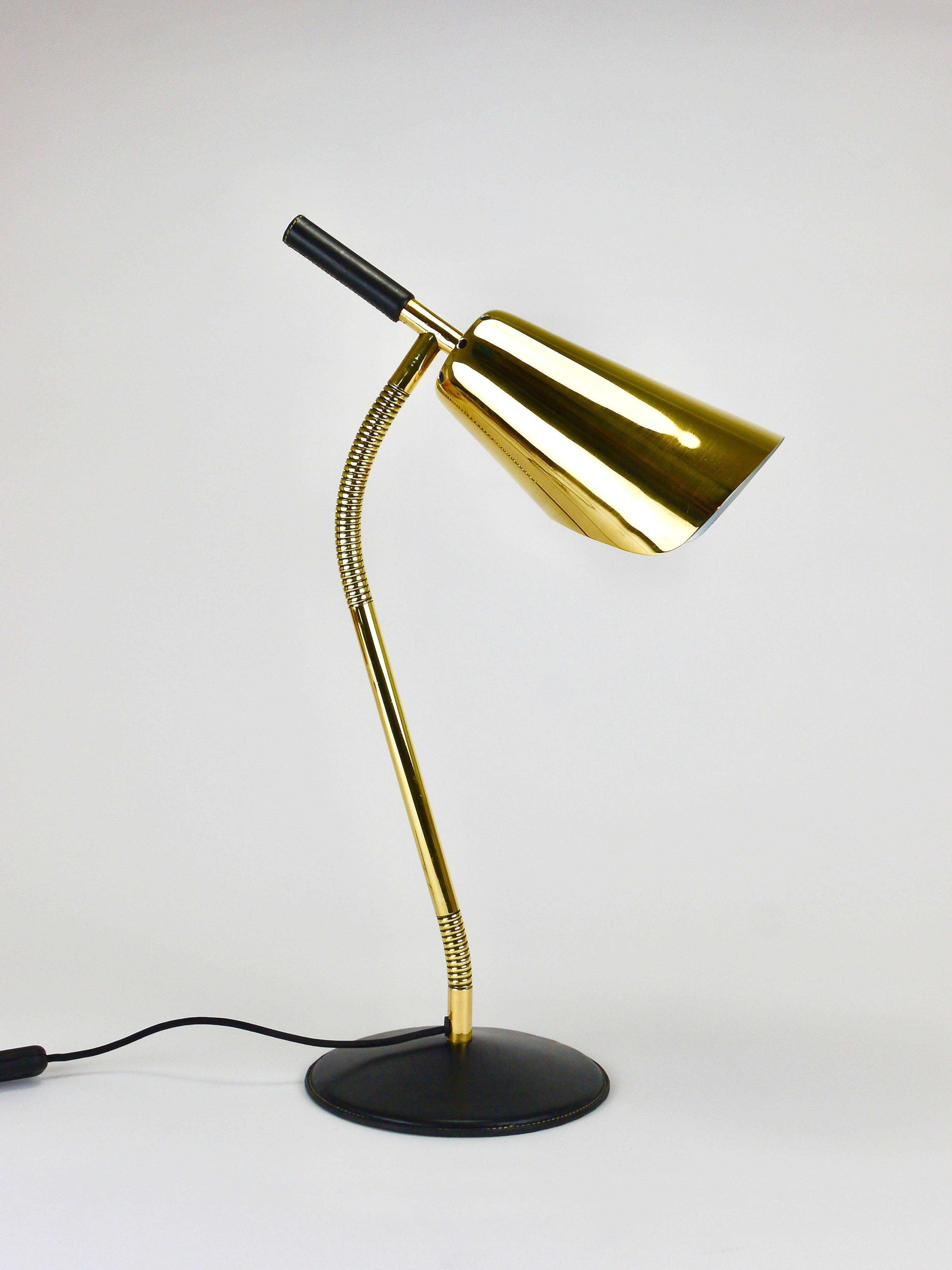 Rare desk and table lamp in brass and leather by Carl Aubock II #4280, Vienna, Austria.
