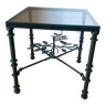 Table basse carrée en métal et plateau vitré