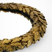 Beautiful small French mid-century wall mirror with an ornate brass frame