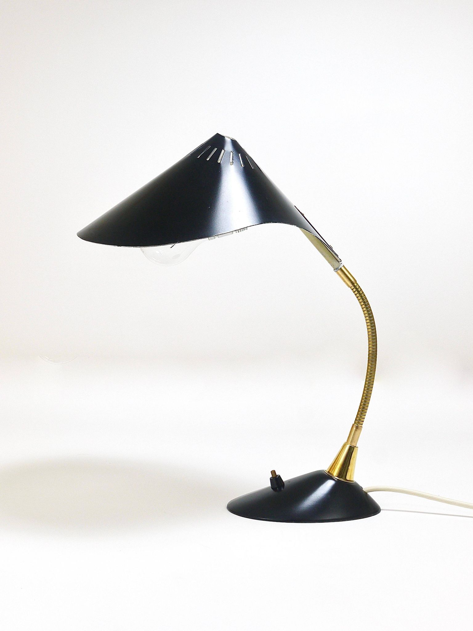 1950s Cosack Cobra black desk or table lamp in brass, mid-century, Stilnovo style.