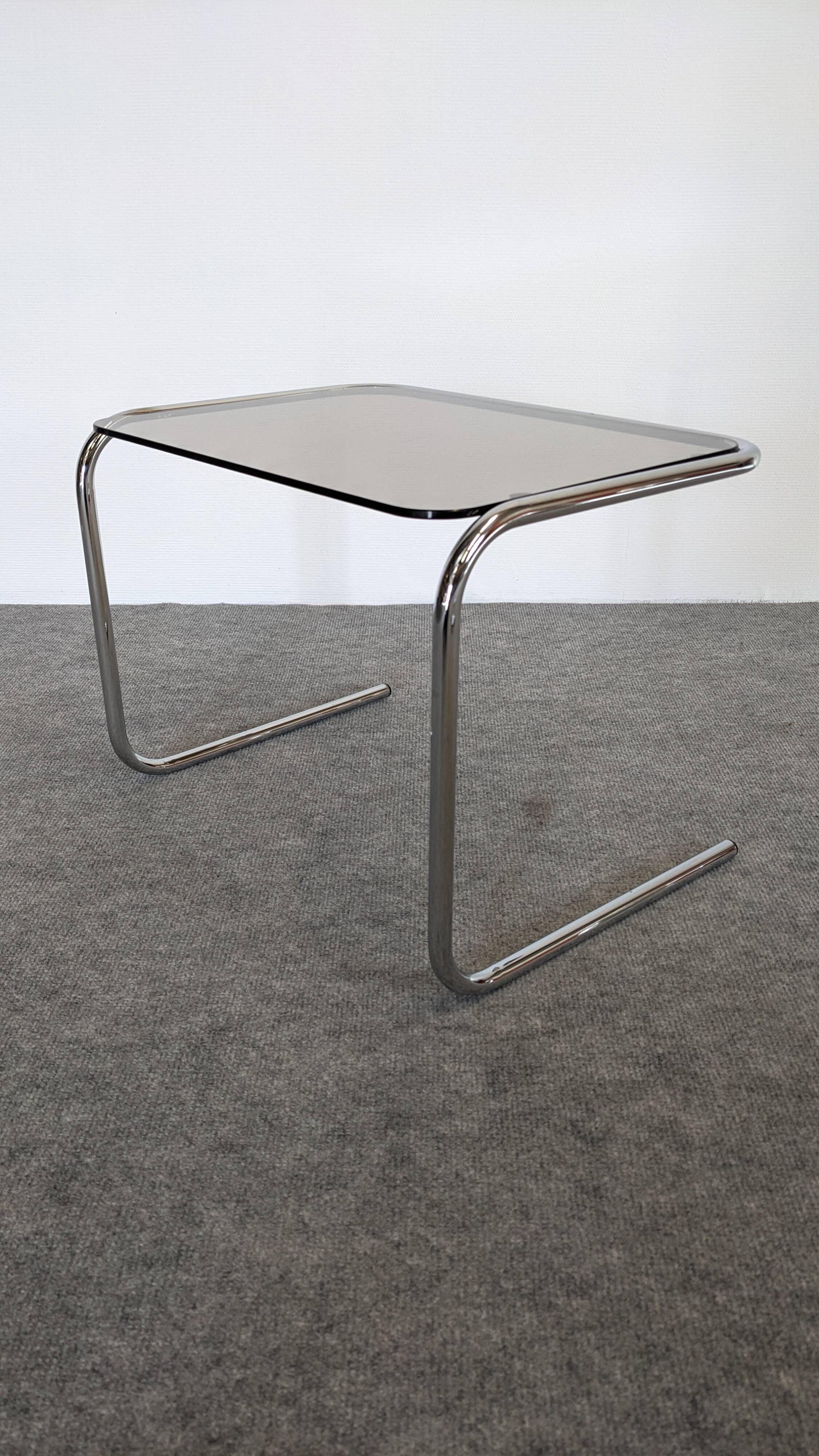 Nested tables with tubular chrome and smoked glass, France 1970.