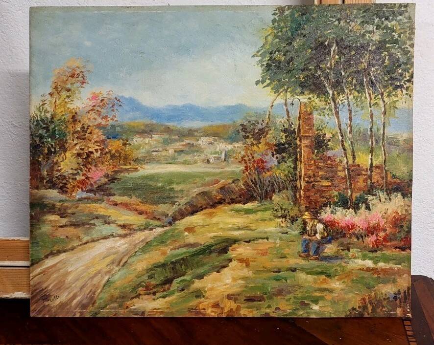 Oil painting on panel of a rural landscape, signed.