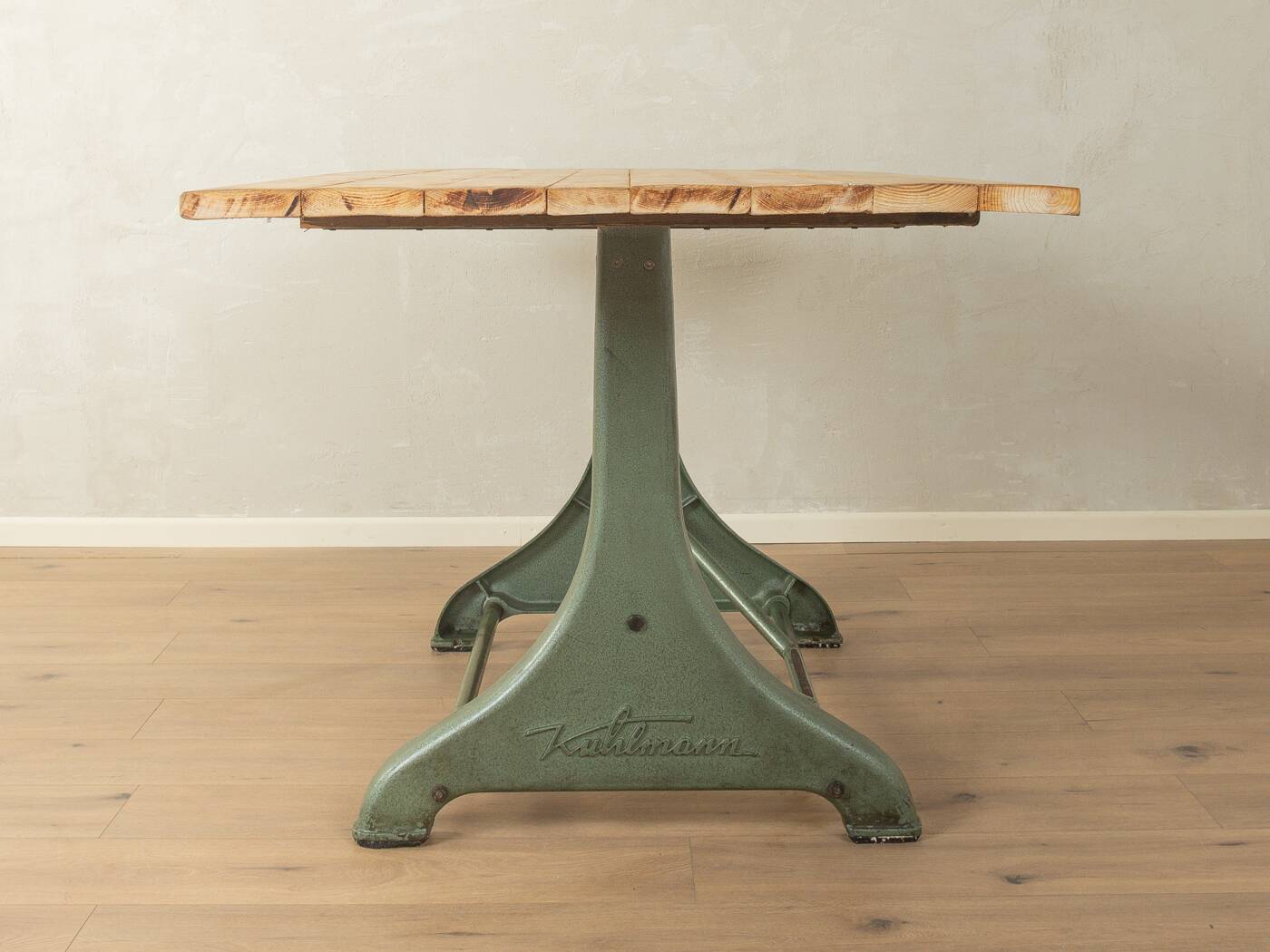 Unique dining table with cast iron base and solid wood top