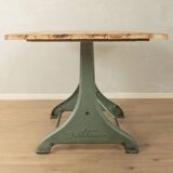 Unique dining table with cast iron base and solid wood top