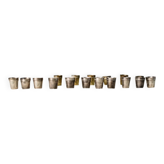 Set of 17 liquor glasses in silver metal and brass
