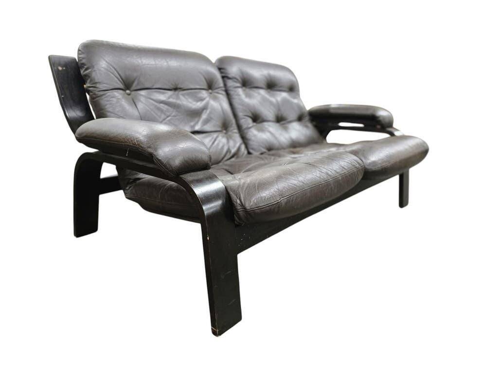 Vintage brown leather two-seater sofa