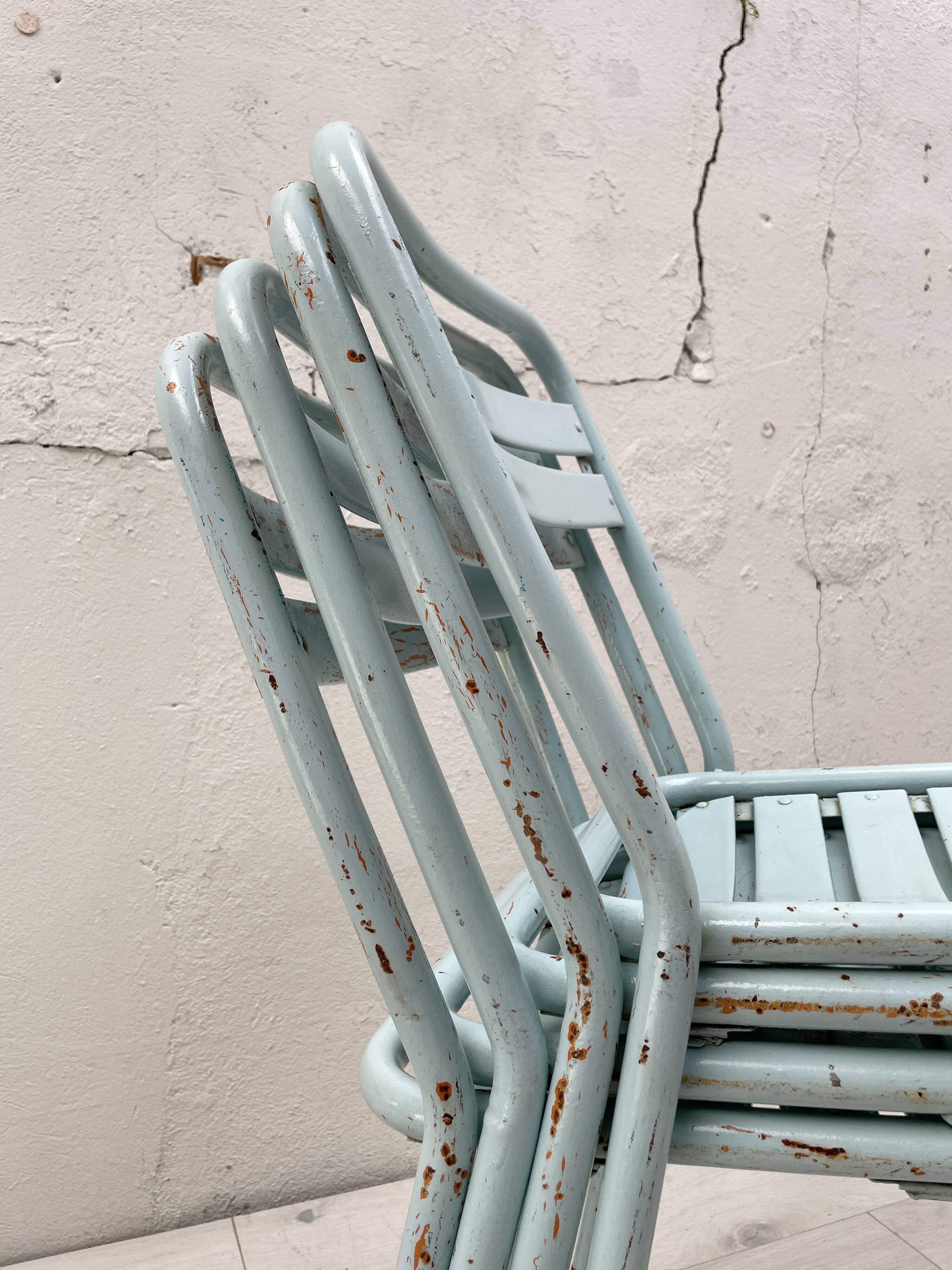 Set of four Tolix T2 chairs, circa 1950.