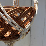 Hanging plant holders in macramé and rattan