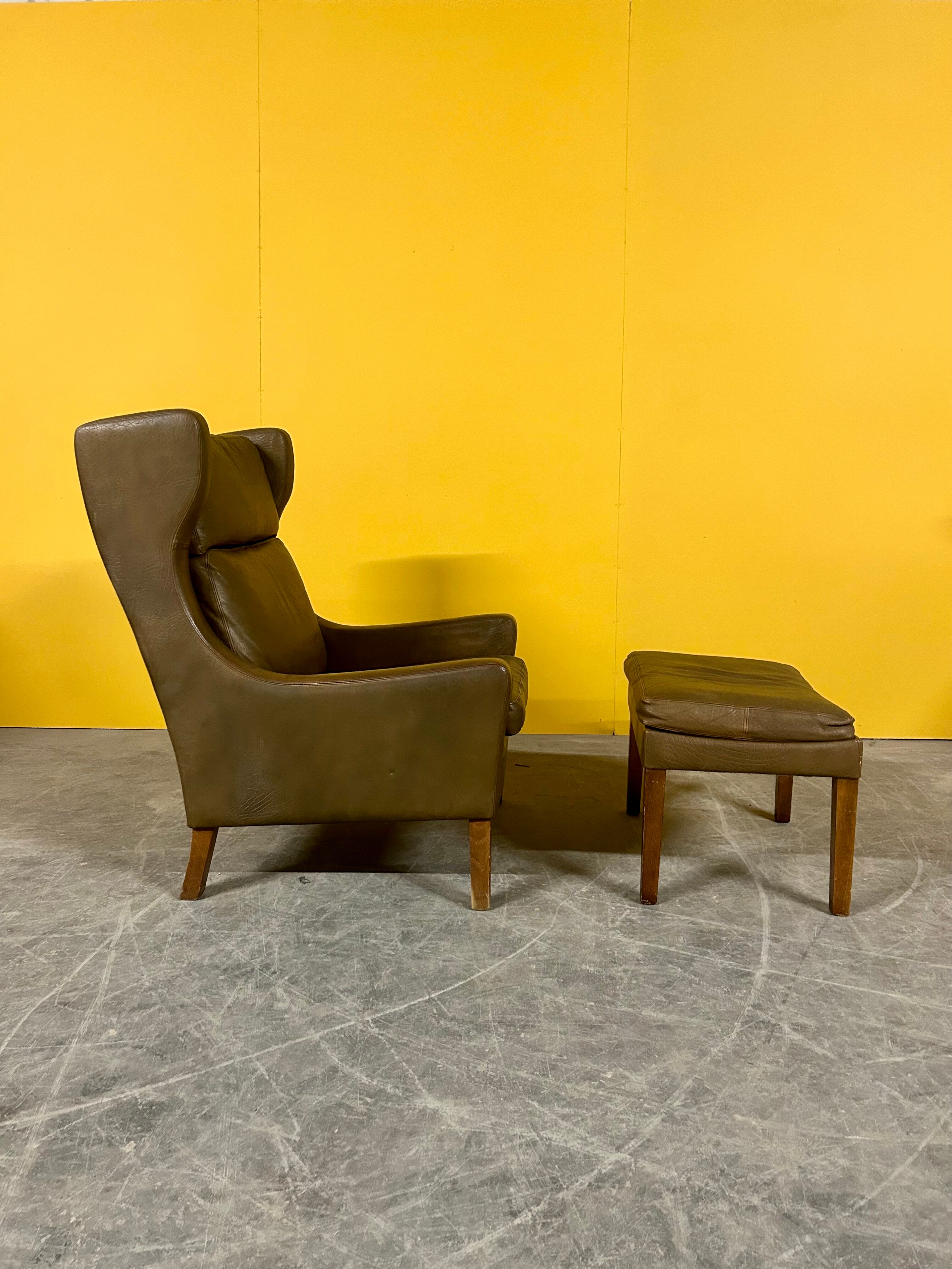 Fauteuil en cuir vintage danois à dossier haut années 1960
