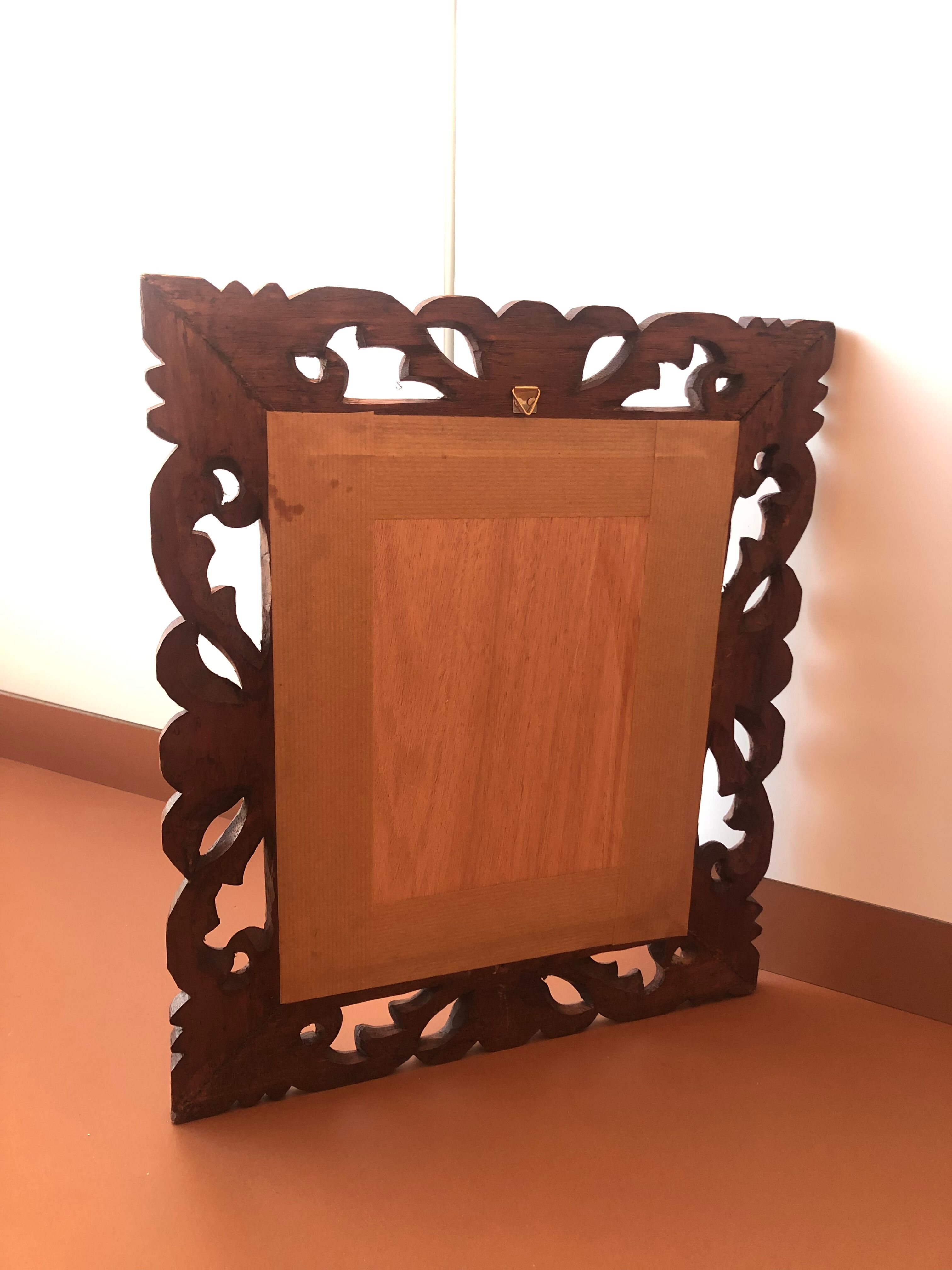 Old mirror carved wooden frame