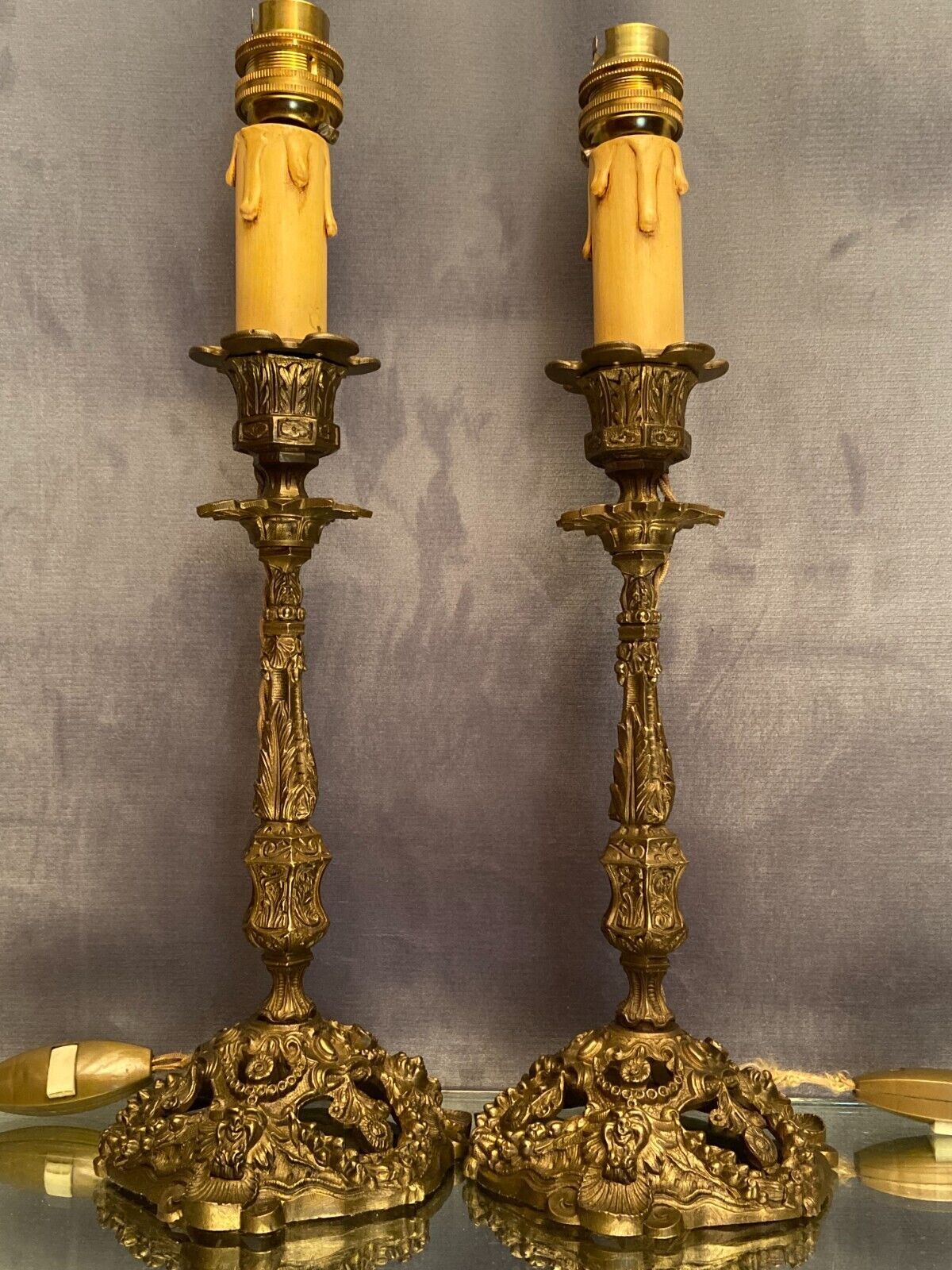Pair of candlesticks mounted in late nineteenth century bronze lamp base Renaissance style