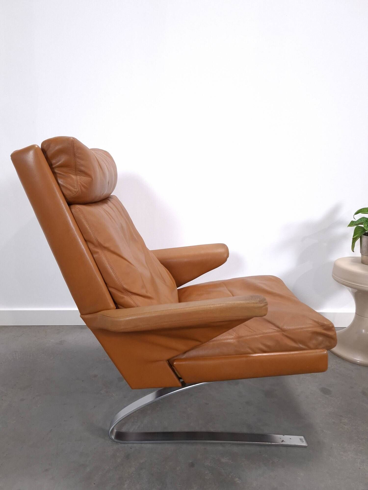 Vintage COR Swing armchair with ottoman, Reinhold Adolf, cognac leather