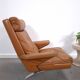Vintage COR Swing armchair with ottoman, Reinhold Adolf, cognac leather