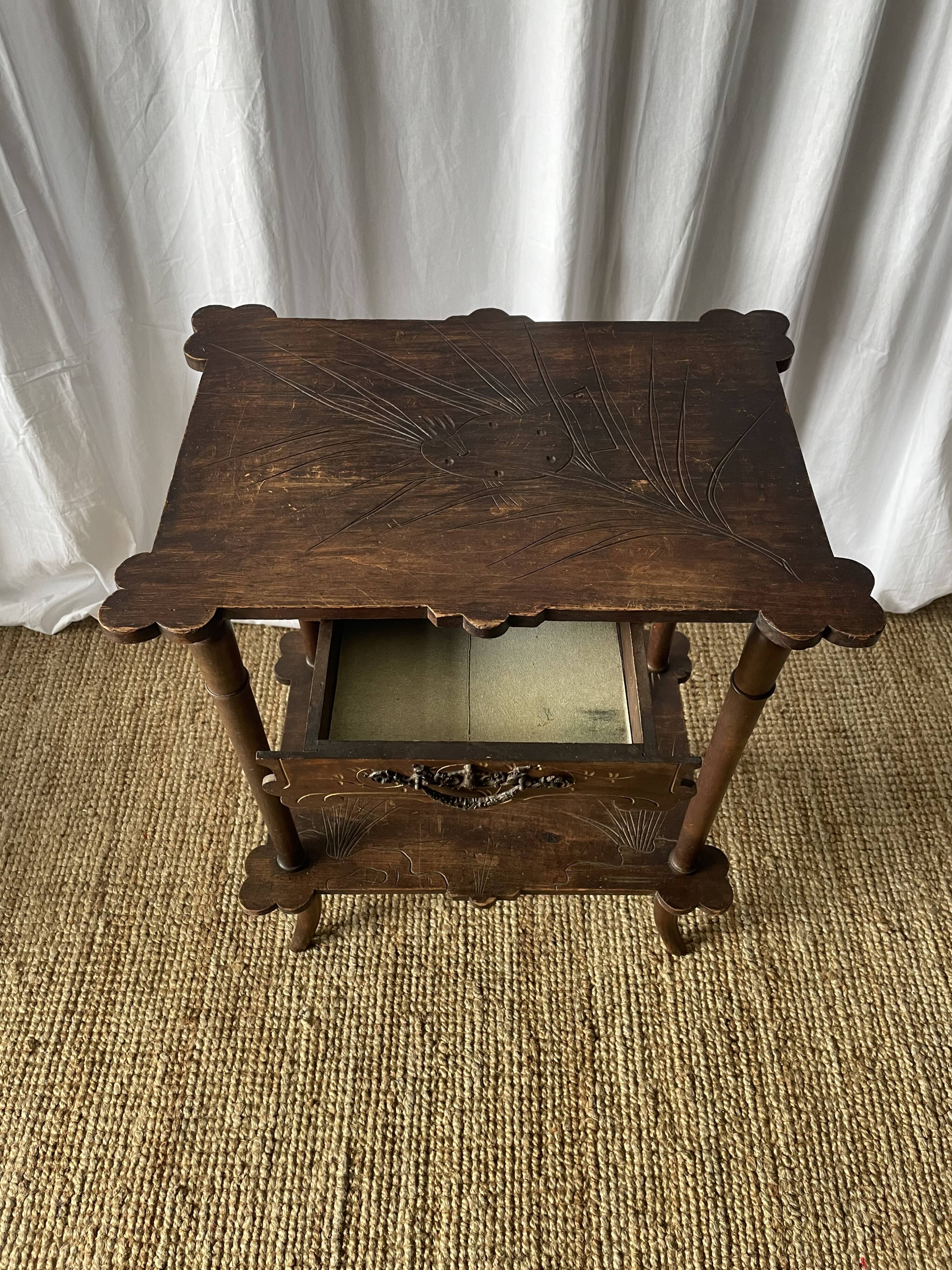 Elegant Art Nouveau side table in walnut, France early 20th century.